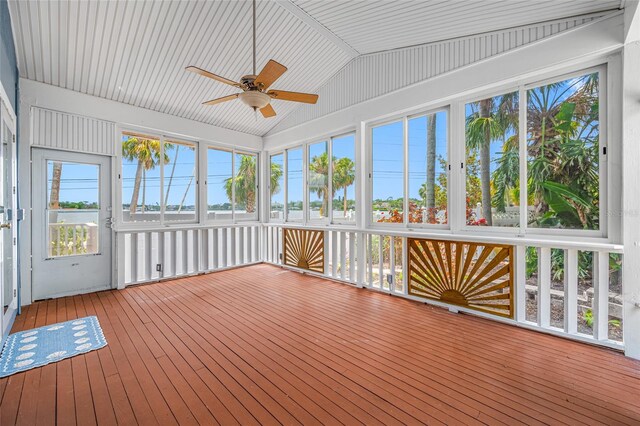 401 Whitcomb Blvd, Tarpon Springs, FL 34689 - unfurnished sunroom featuring ceiling fan, a water view, and vaulted ceiling