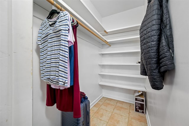 401 Whitcomb Blvd, Tarpon Springs, FL 34689 - spacious closet featuring tile patterned floors