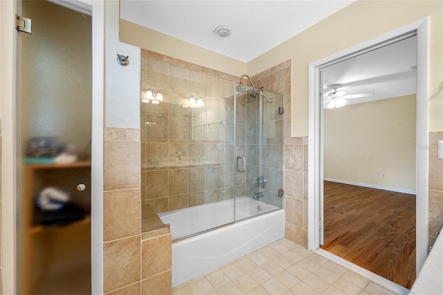 401 Whitcomb Blvd, Tarpon Springs, FL 34689 - bathroom with combined bath / shower with glass door, a ceiling fan, and tile patterned floors