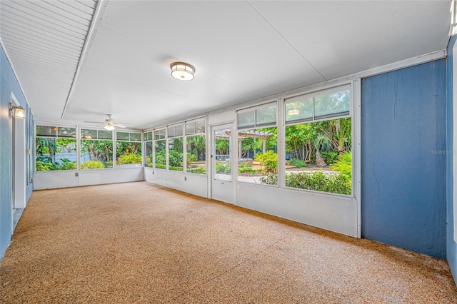 401 Whitcomb Blvd, Tarpon Springs, FL 34689 - unfurnished sunroom with plenty of natural light and a ceiling fan