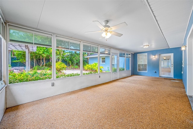 401 Whitcomb Blvd, Tarpon Springs, FL 34689 - unfurnished sunroom featuring plenty of natural light and ceiling fan