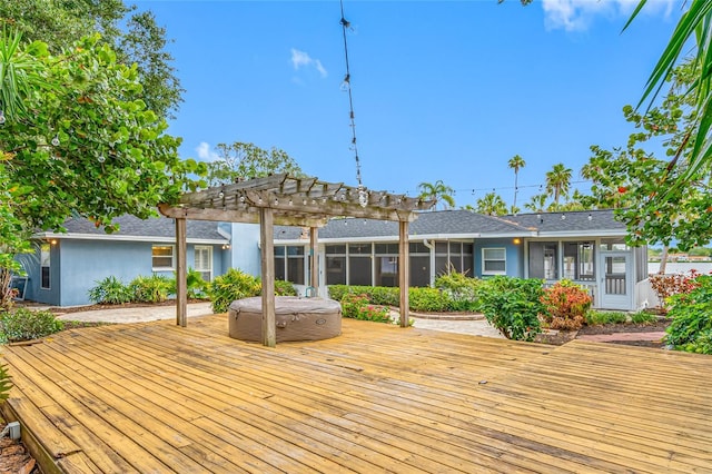 401 Whitcomb Blvd, Tarpon Springs, FL 34689 - wooden terrace with a pergola, a covered hot tub, and a sunroom
