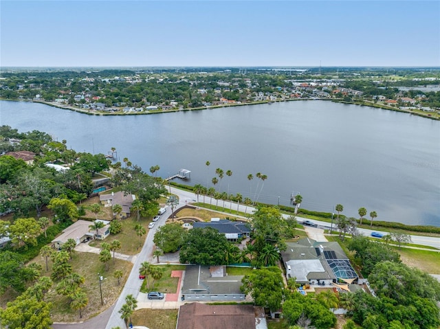 401 Whitcomb Blvd, Tarpon Springs, FL 34689 - aerial overview of property's location featuring a large body of water and nearby suburban area