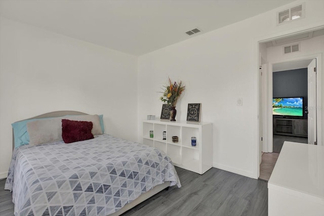 5875 Darren Ct N, Clearwater, FL 33760 - bedroom with wood finished floors and baseboards