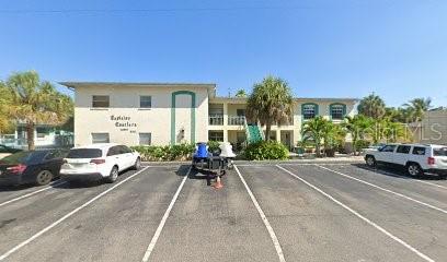 510 70th Ave, St Pete Beach, FL 33706 - view of building exterior featuring uncovered parking