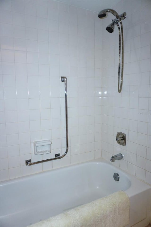 bathroom with shower / bathtub combination