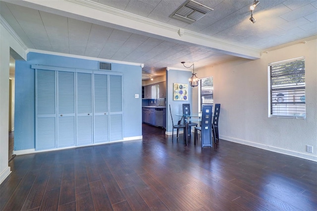 520 4th St NW, Largo, FL 33770 - dining room featuring crown molding, plenty of natural light, dark wood-type flooring, and baseboards