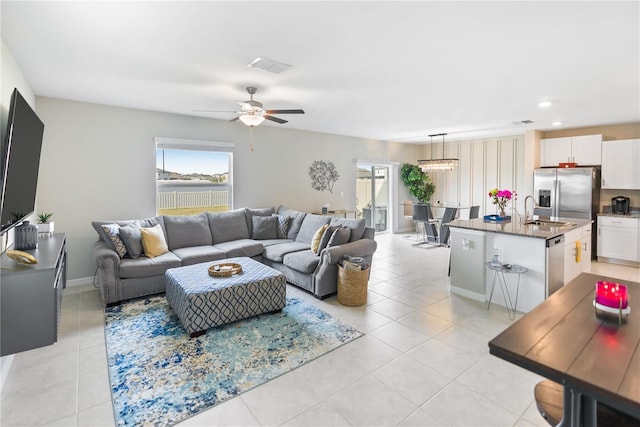 9313 Lemon Drop Loop, Sun City Center, FL 33573 - living area with light tile patterned floors, a ceiling fan, and recessed lighting