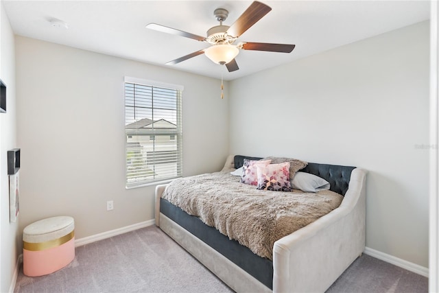 9313 Lemon Drop Loop, Sun City Center, FL 33573 - bedroom featuring carpet floors, baseboards, and a ceiling fan