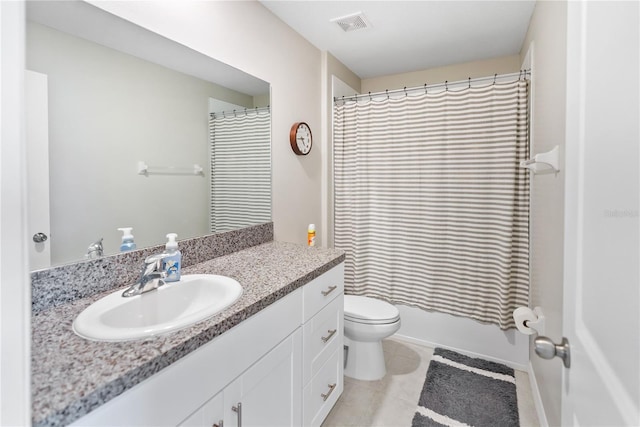 9313 Lemon Drop Loop, Sun City Center, FL 33573 - bathroom with toilet, vanity, tile patterned floors, and shower / tub combo with curtain
