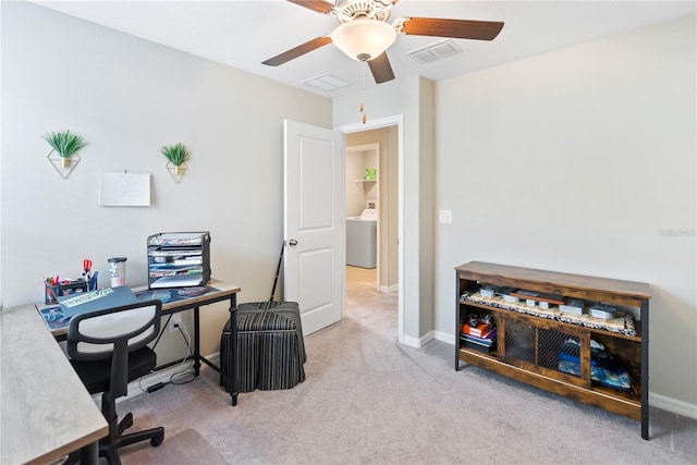 9313 Lemon Drop Loop, Sun City Center, FL 33573 - carpeted office space featuring washer / clothes dryer, a ceiling fan, and baseboards