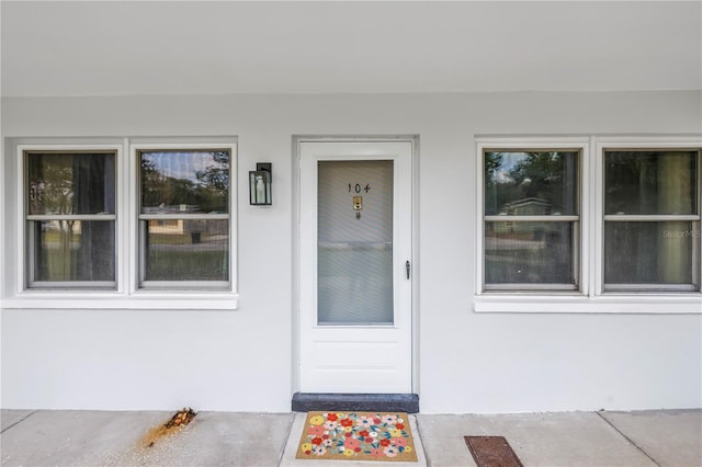 7801 11th St N Unit 104, Saint Petersburg, FL 33702 - entrance to property with stucco siding
