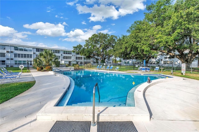 7801 11th St N Unit 104, Saint Petersburg, FL 33702 - community pool with fence and a patio