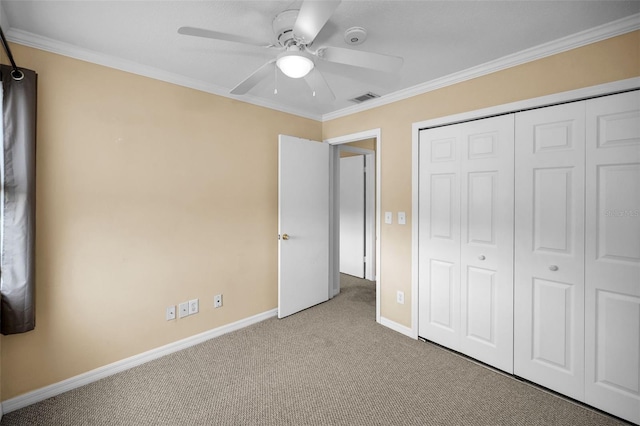 1864 Clearbrooke Dr, Clearwater, FL 33760 - unfurnished bedroom with carpet floors, baseboards, crown molding, a closet, and a ceiling fan