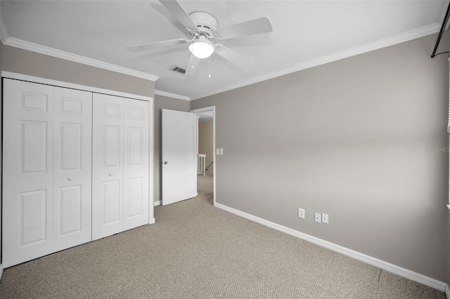1864 Clearbrooke Dr, Clearwater, FL 33760 - unfurnished bedroom featuring carpet flooring, baseboards, a closet, crown molding, and ceiling fan