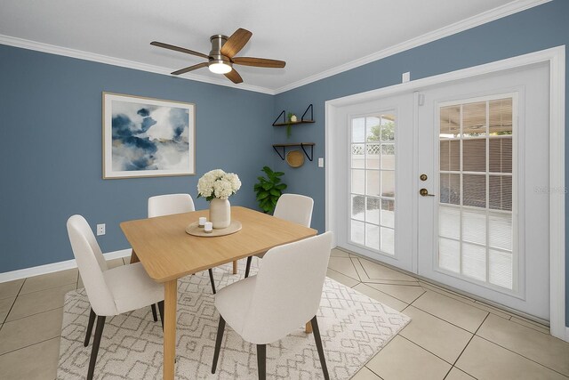 1864 Clearbrooke Dr, Clearwater, FL 33760 - dining space with french doors, light tile patterned floors, ceiling fan, and crown molding