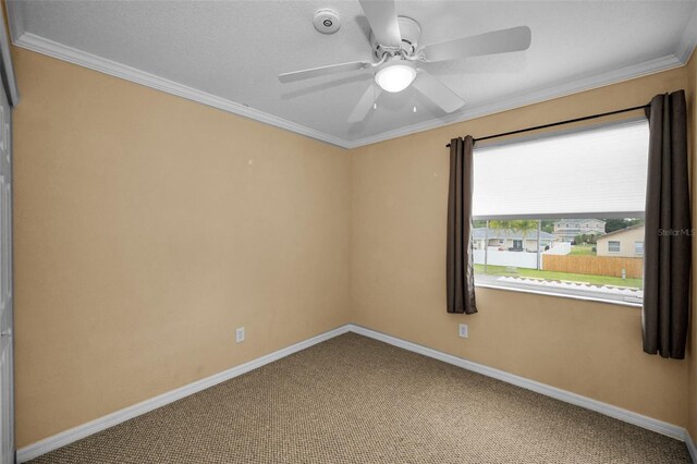 1864 Clearbrooke Dr, Clearwater, FL 33760 - carpeted spare room with ceiling fan, baseboards, and crown molding