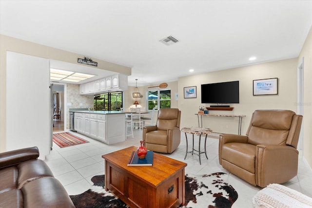535 Sandy Hook, Palm Harbor, FL 34683 - living area with light tile patterned floors and recessed lighting