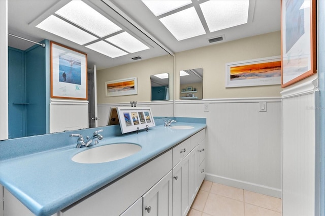 535 Sandy Hook, Palm Harbor, FL 34683 - full bath featuring double vanity and tile patterned flooring