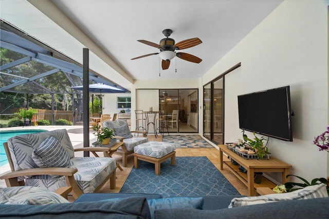 535 Sandy Hook, Palm Harbor, FL 34683 - living area with a sunroom, a ceiling fan, and healthy amount of natural light