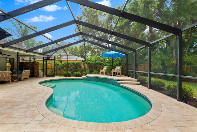 535 Sandy Hook, Palm Harbor, FL 34683 - view of pool featuring a patio, a fenced backyard, glass enclosure, and a ceiling fan