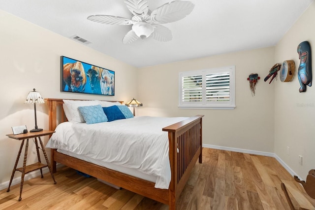 535 Sandy Hook, Palm Harbor, FL 34683 - bedroom featuring wood finished floors, baseboards, and a ceiling fan