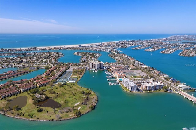 aerial overview of property's location featuring a nearby body of water and nearby urban area