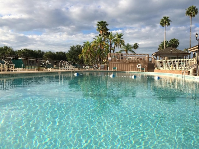 community pool with fence