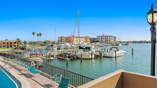 dock area featuring a water view and view of marina