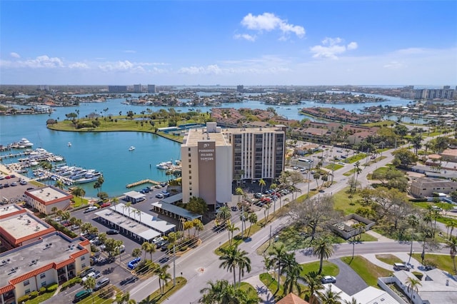 view of urban area with a nearby body of water and a marina