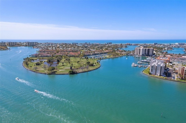 view of urban area with a large body of water
