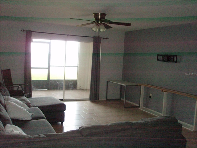 2980 Haines Bayshore Rd Unit 124, Clearwater, FL 33760 - living room featuring ceiling fan and tile patterned floors