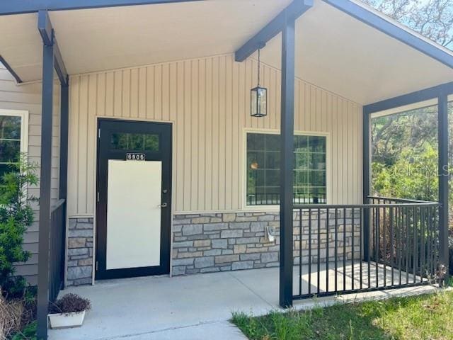 6906 W Barbara Ann Ln, Homosassa, FL 34446 - entrance to property featuring stone siding and a porch