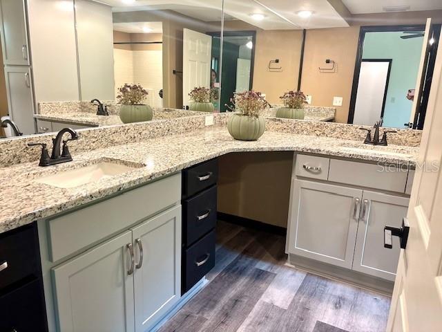 6906 W Barbara Ann Ln, Homosassa, FL 34446 - full bath featuring double vanity and wood finished floors