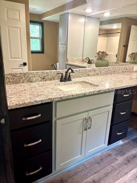 6906 W Barbara Ann Ln, Homosassa, FL 34446 - bathroom with wood finished floors and vanity