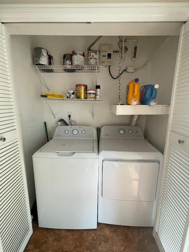 washroom featuring washer and dryer