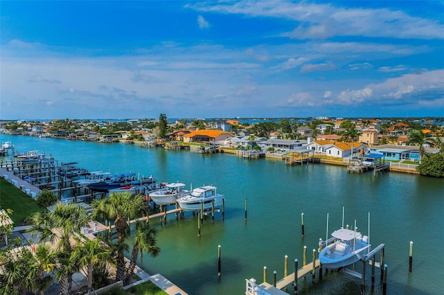 dock featuring boat lift and a water view