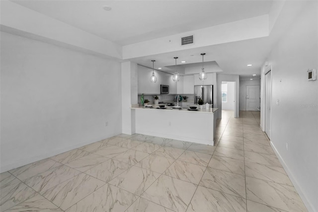 kitchen with appliances with stainless steel finishes, baseboards, white cabinetry, light countertops, and recessed lighting