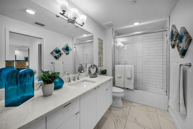 full bathroom with vanity, toilet, marble finish flooring, recessed lighting, and bath / shower combo with glass door