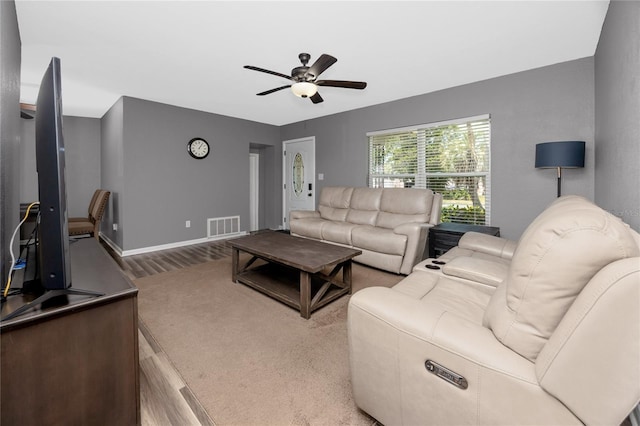 119 N Hillcrest Ave, Clearwater, FL 33755 - living area with a ceiling fan, wood finished floors, and baseboards