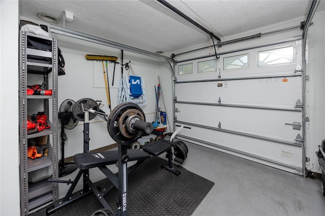 119 N Hillcrest Ave, Clearwater, FL 33755 - exercise area featuring a textured ceiling and a garage