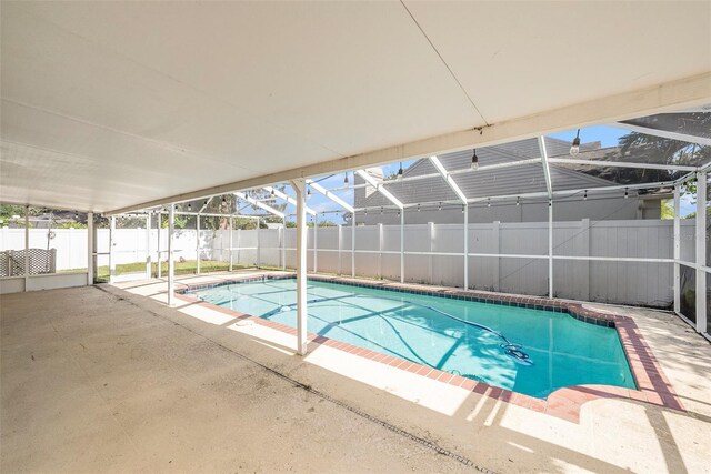 16201 Country Crossing Dr, Tampa, FL 33624 - view of pool with a patio area, a fenced backyard, and glass enclosure