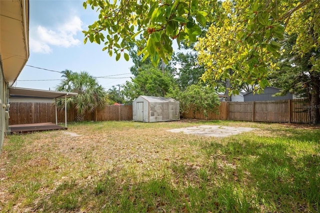 1858 Oregon Ave NE, Saint Petersburg, FL 33703 - view of yard featuring a shed, a patio area, and an outbuilding
