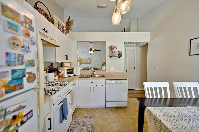 759 Cape Cod Cir, Valrico, FL 33594 - kitchen with white appliances, under cabinet range hood, a sink, a ceiling fan, and light countertops