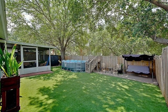 759 Cape Cod Cir, Valrico, FL 33594 - view of yard featuring a sunroom and a wooden deck