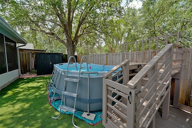 759 Cape Cod Cir, Valrico, FL 33594 - view of yard featuring a sunroom and a deck