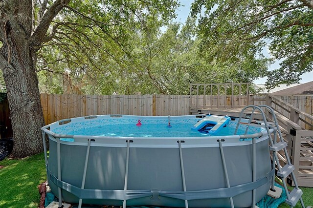 759 Cape Cod Cir, Valrico, FL 33594 - view of swimming pool with a fenced backyard