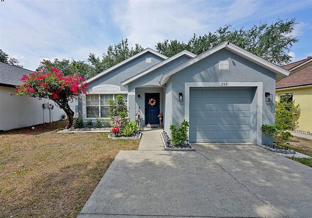 759 Cape Cod Cir, Valrico, FL 33594 - view of front of house featuring concrete driveway, a garage, stucco siding, and a front lawn