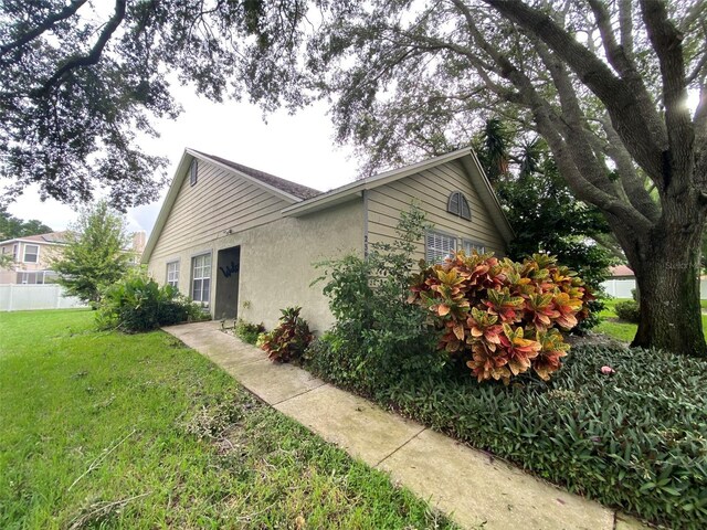 2390 Bentley Dr, Palm Harbor, FL 34684 - view of front of property featuring stucco siding