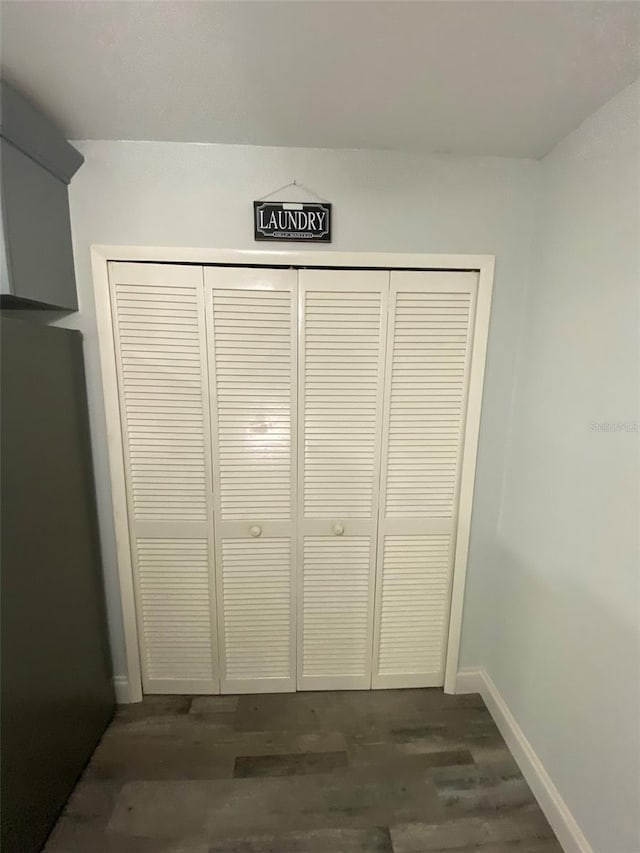 2390 Bentley Dr, Palm Harbor, FL 34684 - detailed view of baseboards and wood finished floors